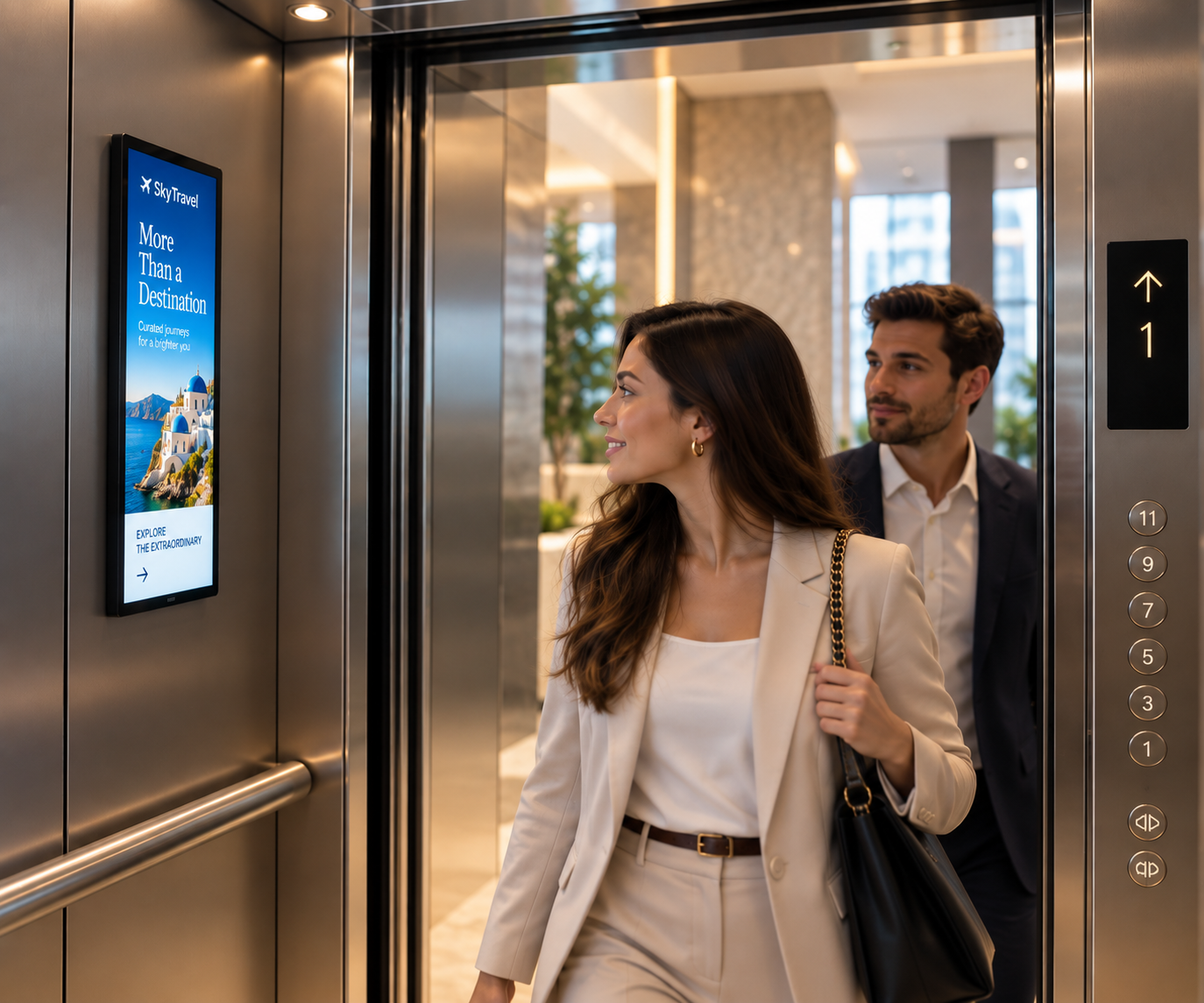People noticing a portrait digital screen beside an elevator